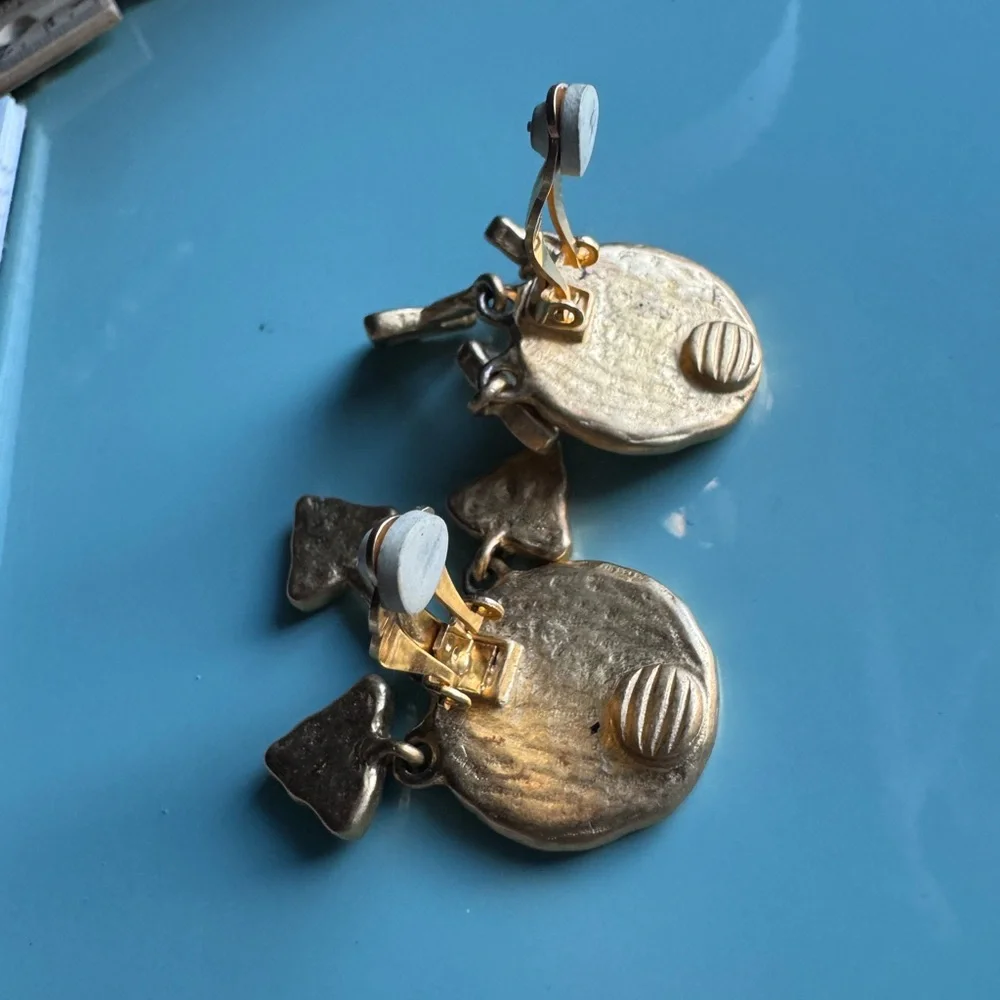 Vintage cream enamel and gold tone clip on dangle earrings